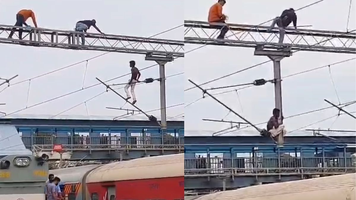रेलवे स्टेशन पर लगे बिजली के खंभे पर चढ़ गया शख्स, उतारने में छूटे पसीने; VIDEO वायरल