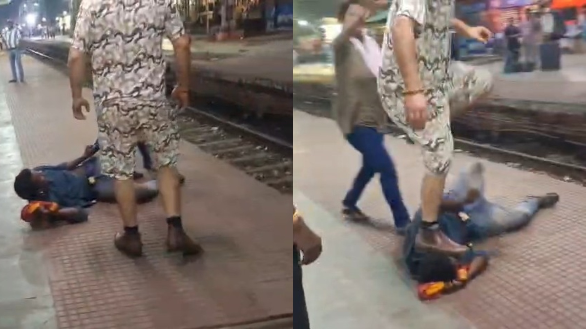 धनबाद जंक्शन का VIDEO वायरल, दबंग ने युवक को बेरहमी से पीटा, जमीन पर पटक कर सिर पर चढ़ गया