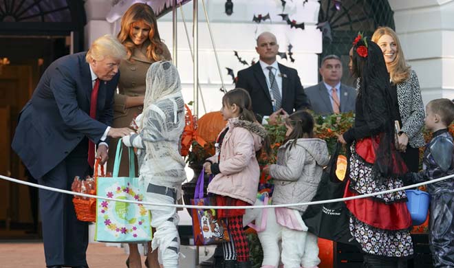 Trump and Melanie did trick and treat during the Halloween... Trump and Melanie did trick and treat during the Halloween...- India TV