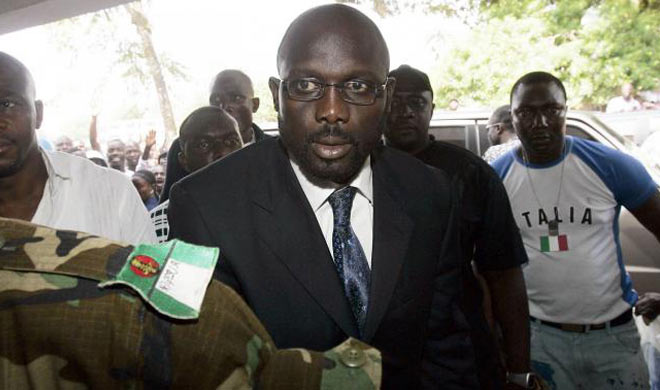 Liberia football star takes oath as president Liberia football star takes oath as president- India TV