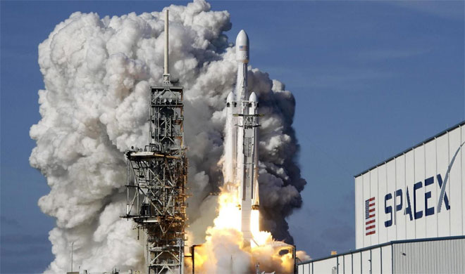 Elon Musk says SpaceX will launch rocket to Mars next year | AP Photo Elon Musk says SpaceX will launch rocket to Mars next year | AP Photo- India TV