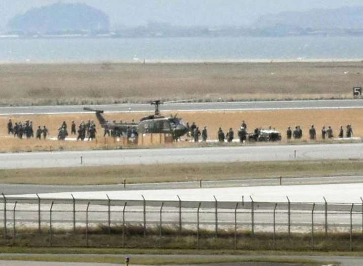 Military helicopter emergency landing in Japan runway... Military helicopter emergency landing in Japan runway...- India TV