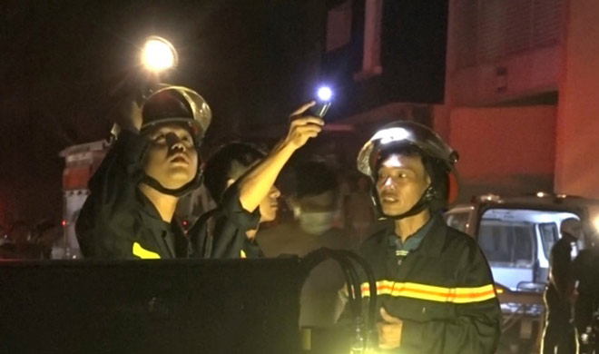 At least 13 people die in Vietnam building fire At least 13 people die in Vietnam building fire- India TV