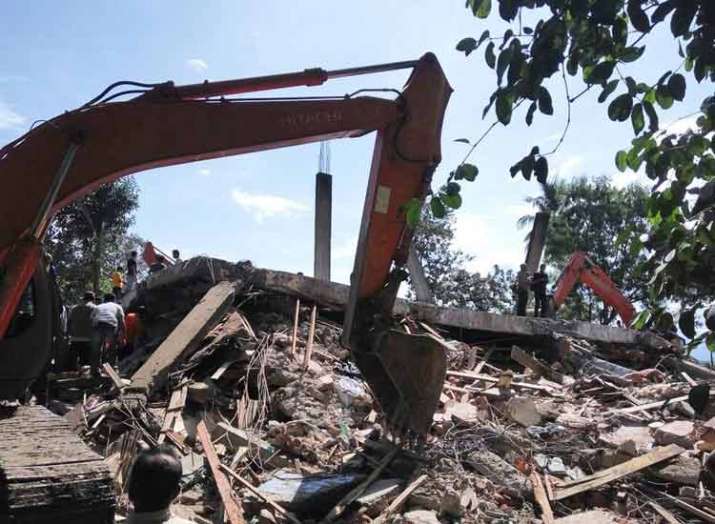 building collapse in Indonesia 7 die including 6... building collapse in Indonesia 7 die including 6...- India TV