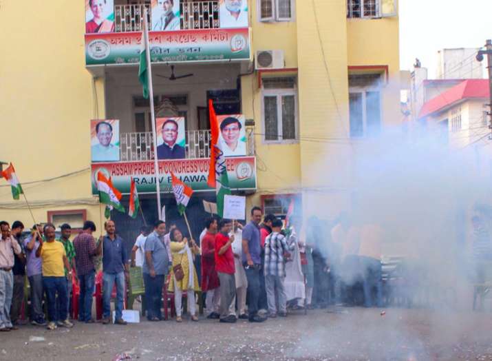 Congress supporters celebrate after the resignation of... Congress supporters celebrate after the resignation of...- India TV