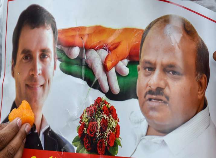 A poster of Congress President Rahul Gandhi and JD(S)... A poster of Congress President Rahul Gandhi and JD(S)...- India TV