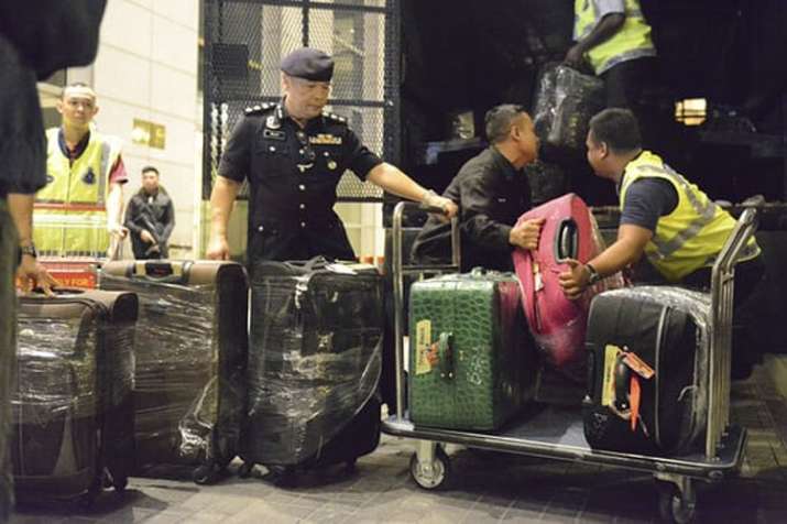 Malaysian police seize dozens of bags of cash, jewels in Najib Razak raids | AP Photo Malaysian police seize dozens of bags of cash, jewels in Najib Razak raids | AP Photo- Khabar IndiaTV
