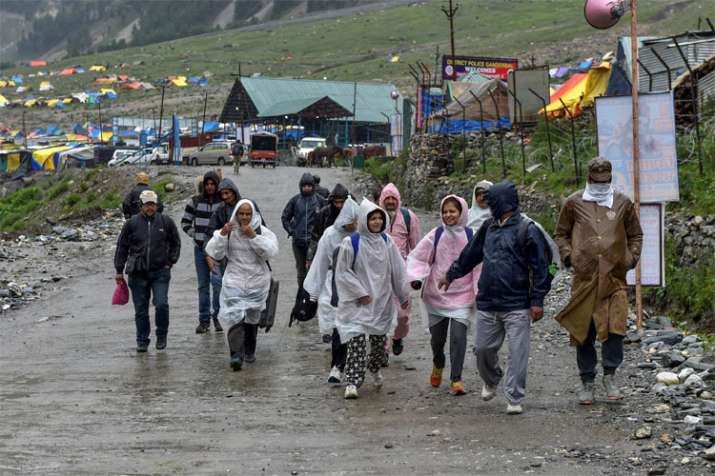 Jammu and Kashmir: Amarnath Yatra resumes after weather improves | PTI Jammu and Kashmir: Amarnath Yatra resumes after weather improves | PTI- India TV