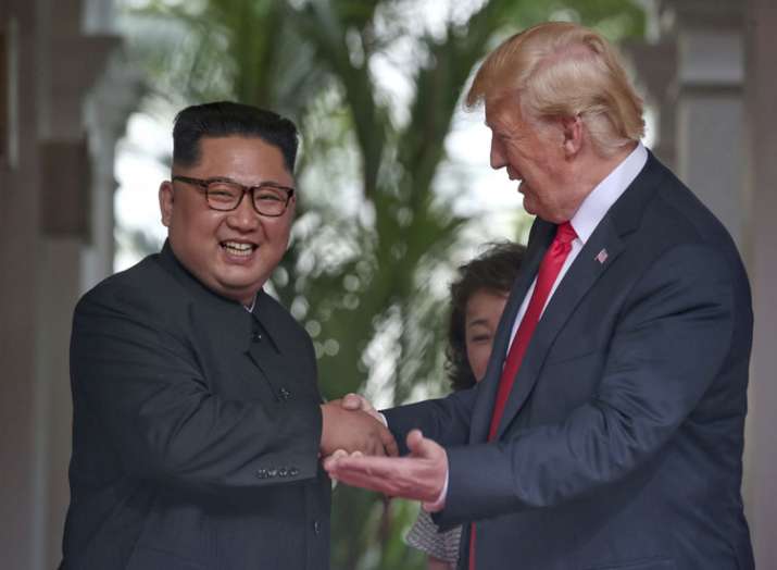 U. S. President Donald Trump shakes hands with North... U. S. President Donald Trump shakes hands with North...- India TV