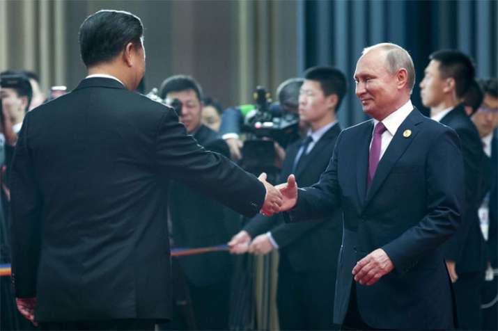 SCO Summit: As G7 feuds, Xi Jinping and Vladimir Putin play up their own club | AP SCO Summit: As G7 feuds, Xi Jinping and Vladimir Putin play up their own club | AP- India TV