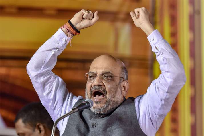 Cong merely talked of 'garibi hatao', Modi govt transformed lives of tribal, poor people: Shah Cong merely talked of 'garibi hatao', Modi govt transformed lives of tribal, poor people: Shah- India TV