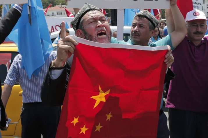 US lawmakers call for China sanctions over Xinjiang Muslim camps | AP Representational US lawmakers call for China sanctions over Xinjiang Muslim camps | AP Representational- India TV