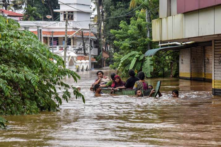 People being rescued from a flood-affected region... People being rescued from a flood-affected region...- India TV