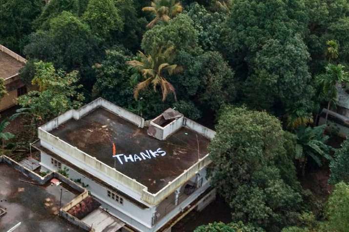 'Thanks' is written on the roof of a building to convey... 'Thanks' is written on the roof of a building to convey...- India TV