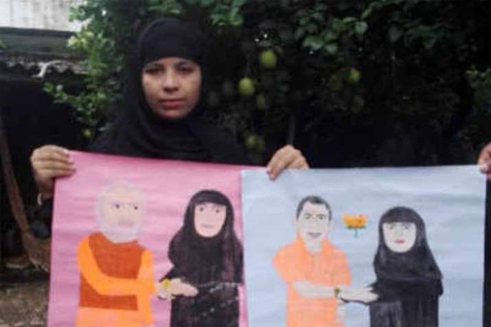 Uttar Pradesh: Muslim woman celebrates Rakshabandhan with portraits of PM Modi and CM Yogi| Facebook Uttar Pradesh: Muslim woman celebrates Rakshabandhan with portraits of PM Modi and CM Yogi| Facebook- India TV