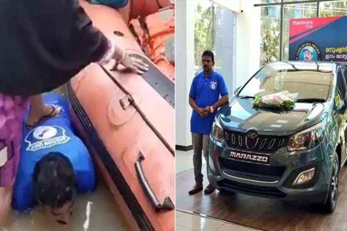 महिलाओं को बाढ़ से बचने के लिए पीठ पर चढ़ाने वाले मछुआरे को मिली गिफ्ट में कार महिलाओं को बाढ़ से बचने के लिए पीठ पर चढ़ाने वाले मछुआरे को मिली गिफ्ट में कार- India TV