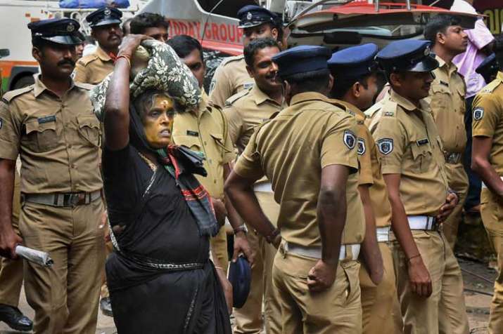 An elderly woman on her way to Sabarimala Temple as... An elderly woman on her way to Sabarimala Temple as...- India TV