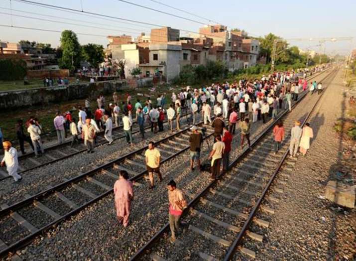 Amritsar train tragedy: After calling it 'tresspassing', Railways orders probe into deadly incident Amritsar train tragedy: After calling it 'tresspassing', Railways orders probe into deadly incident - India TV