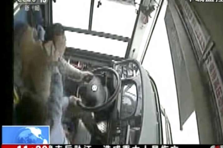 China: brawl between passenger and driver, bus plunged into river, 13 killed China: brawl between passenger and driver, bus plunged into river, 13 killed - India TV