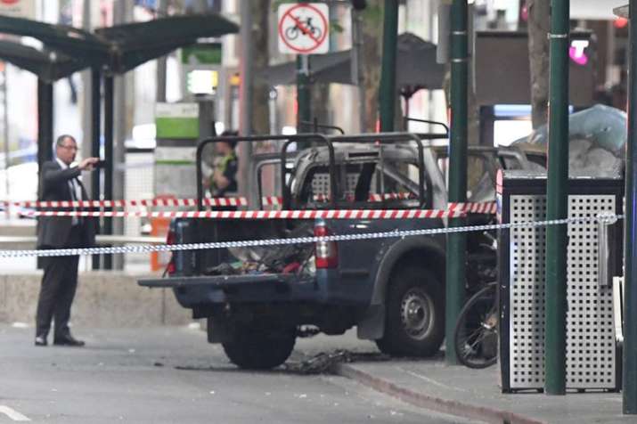 A burnt out vehicle is seen on Bourke Street in Melbourne, Friday, Nov. 9, 2018 | AP Photo A burnt out vehicle is seen on Bourke Street in Melbourne, Friday, Nov. 9, 2018 | AP Photo- India TV
