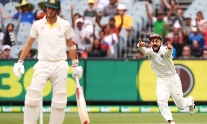 Virat Kohli celebrates after Pat Cummins wicket Virat Kohli celebrates after Pat Cummins wicket- India TV