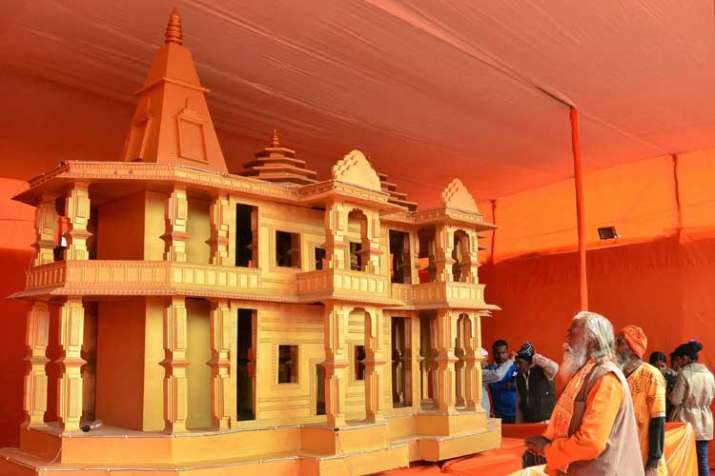 People look at a model of Ram Mandir, to be built in... People look at a model of Ram Mandir, to be built in...- India TV