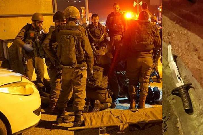 Soldiers at the scene of an attempted stabbing attack near the West Bank city of Nablus Soldiers at the scene of an attempted stabbing attack near the West Bank city of Nablus- India TV
