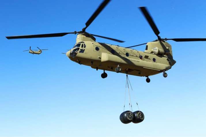 First batch of Chinook military helicopters arrives in India from US First batch of Chinook military helicopters arrives in India from US- India TV