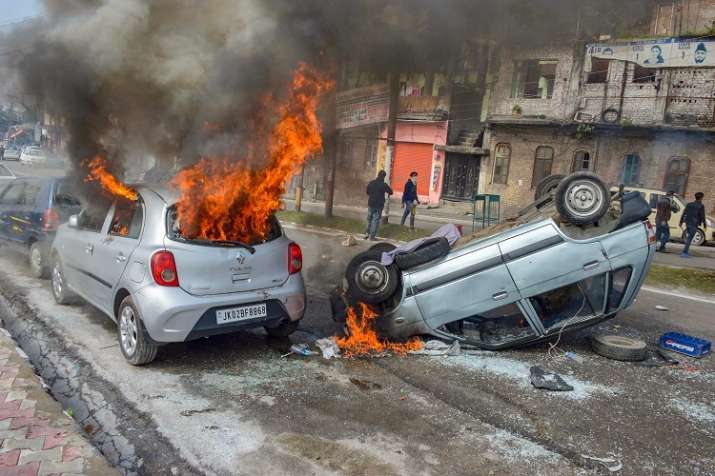 Vehicles set on fire by protestors against the killing... Vehicles set on fire by protestors against the killing...- India TV