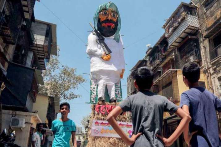Holi bonfire: Effigies of Masood Azhar, Hafiz Saeed put... Holi bonfire: Effigies of Masood Azhar, Hafiz Saeed put...- India TV