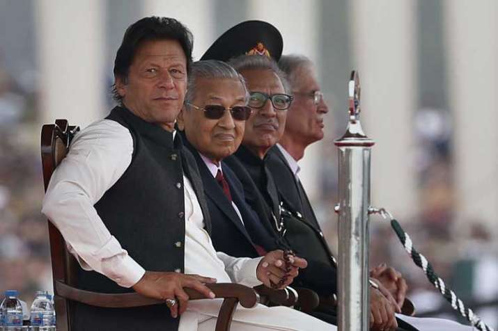 Malaysian Prime Minister Mahtir Mohamad, second left,... Malaysian Prime Minister Mahtir Mohamad, second left,...- India TV