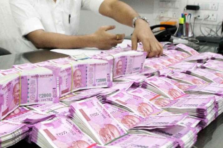 Bundles of cash seized from shop in Tamil Nadu, police open fire to disperse AMMK cadres Bundles of cash seized from shop in Tamil Nadu, police open fire to disperse AMMK cadres- India TV