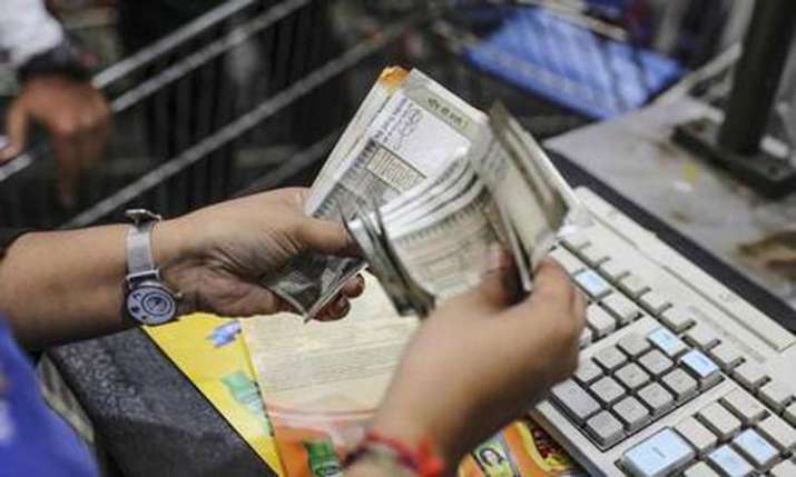 Rupee falls by 24 paise on strong dollar demand Rupee falls by 24 paise on strong dollar demand- India TV Paisa