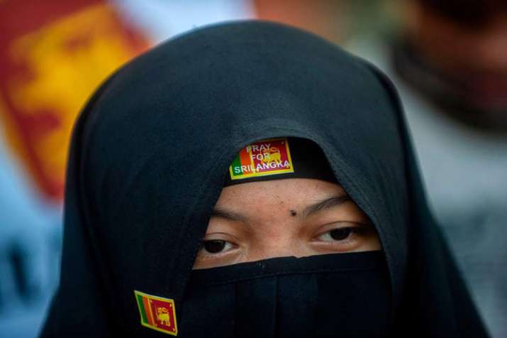 Sri Lanka bans burqas for 'public protection' after bomb attacks Sri Lanka bans burqas for 'public protection' after bomb attacks- India TV