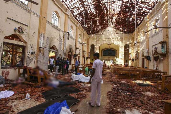 Dead bodies of victims lie inside St. Sebastian's Church... Dead bodies of victims lie inside St. Sebastian's Church...- India TV
