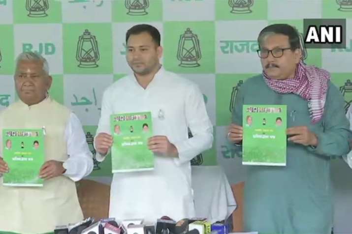 Rashtriya Janata Dal (RJD) releases their manifesto for Lok Sabha Elections 2019 | ANI Rashtriya Janata Dal (RJD) releases their manifesto for Lok Sabha Elections 2019 | ANI- India TV