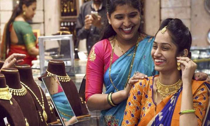 Gold prices surge by Rs 180 on firm global trend Gold prices surge by Rs 180 on firm global trend- India TV Paisa