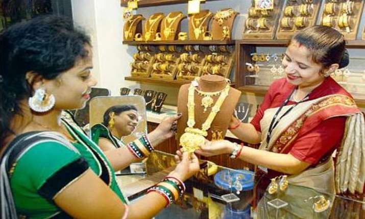 Gold prices rise by Rs 70 on jewellers' buying Gold prices rise by Rs 70 on jewellers' buying- India TV Paisa
