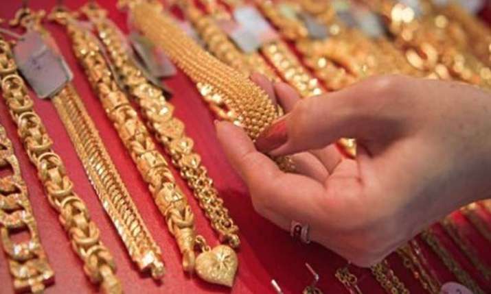 Gold slides on tepid demand, weak overseas trend Gold slides on tepid demand, weak overseas trend- India TV Paisa