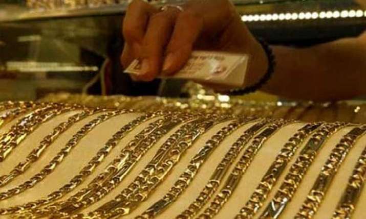 Gold prices fall on muted demand from jewellers; silver firms up Gold prices fall on muted demand from jewellers; silver firms up- India TV Paisa