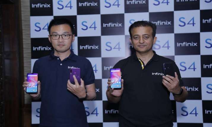 Infinix launches new smartphone, fitness band in India Infinix launches new smartphone, fitness band in India- India TV Paisa