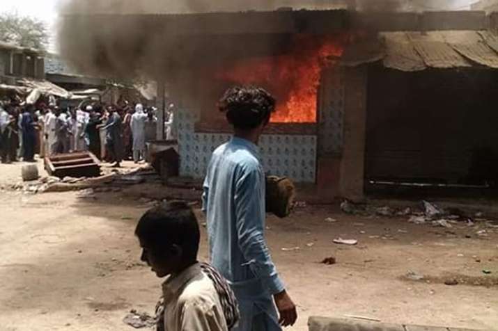 Mob violence in Mirpurkhas of Pakistan after Hindu doctor is accused of blasphemy | Facebook Mob violence in Mirpurkhas of Pakistan after Hindu doctor is accused of blasphemy | Facebook- India TV