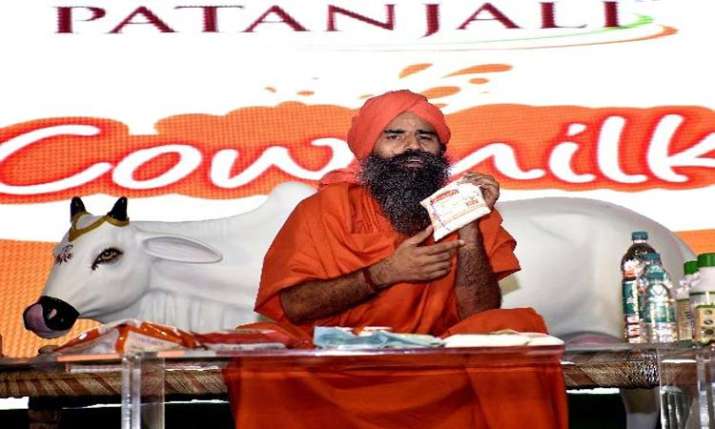 Patanjali launched tond milk at Rs 40 per litre Patanjali launched tond milk at Rs 40 per litre - India TV Paisa