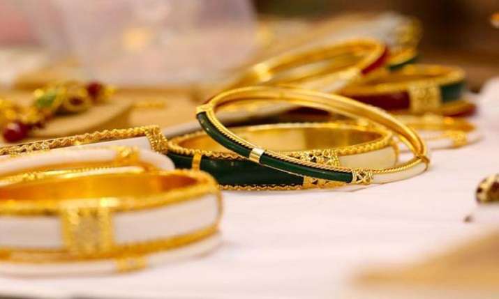 Gold surges Rs 300 on fresh buying, strong global trend Gold surges Rs 300 on fresh buying, strong global trend- India TV Paisa