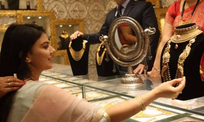Gold rises on jewellers' buying, positive overseas trend Gold rises on jewellers' buying, positive overseas trend- India TV Paisa