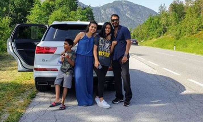Kajol and Ajay Devgn with their kids Kajol and Ajay Devgn with their kids- India TV
