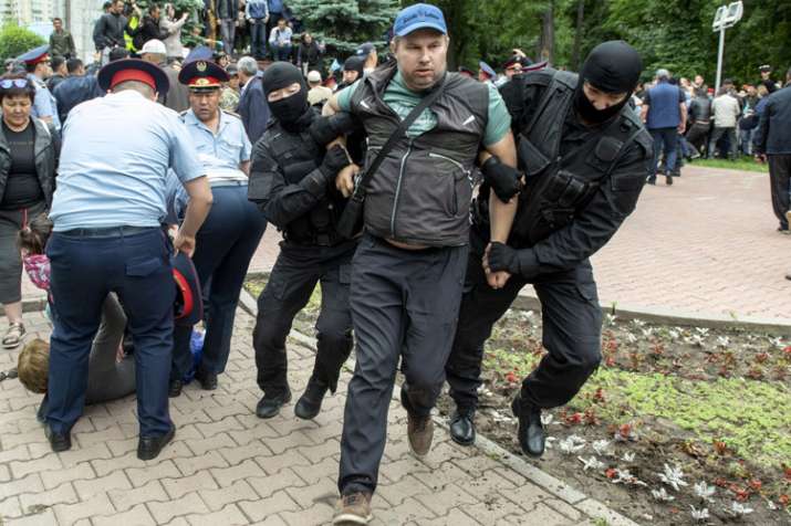Kazakhstan police beat journalist amid post-vote unrest | AP Kazakhstan police beat journalist amid post-vote unrest | AP- India TV