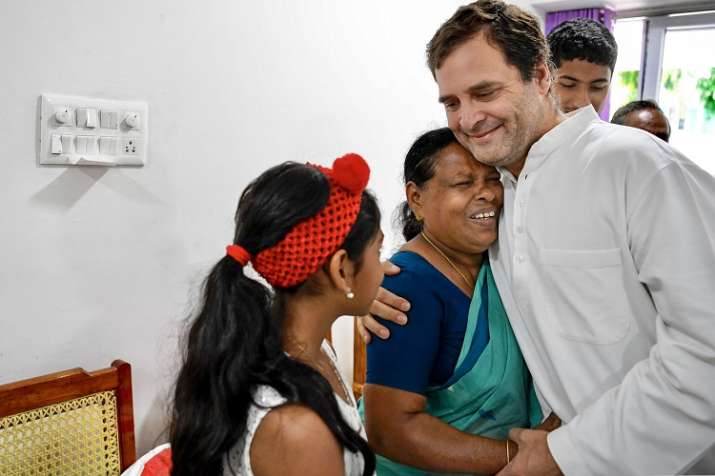 Rahul Gandhi meets Rajamma, who was his delivery nurse in hospital. Rahul Gandhi meets Rajamma, who was his delivery nurse in hospital.- India TV