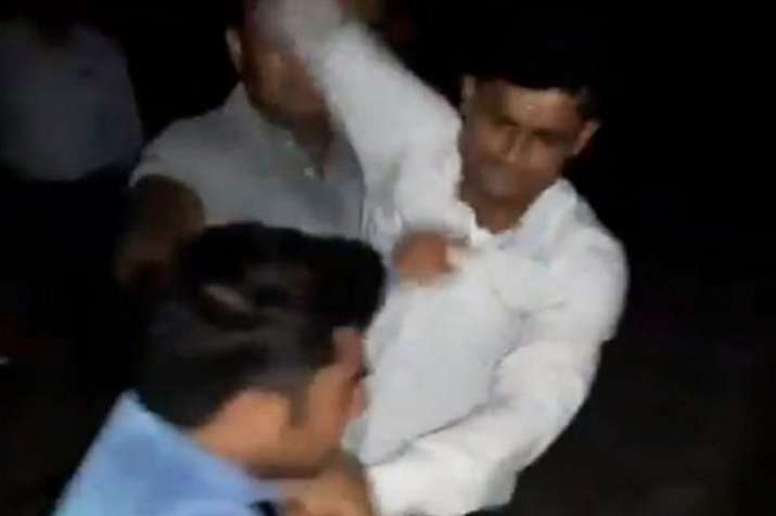 GRP SHO and constable suspended for thrashing and allegedly urinating on journalist GRP SHO and constable suspended for thrashing and allegedly urinating on journalist- India TV
