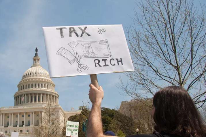 US billionaires urging US government more tax on them to eradicate poverty US billionaires urging US government more tax on them to eradicate poverty- India TV Paisa